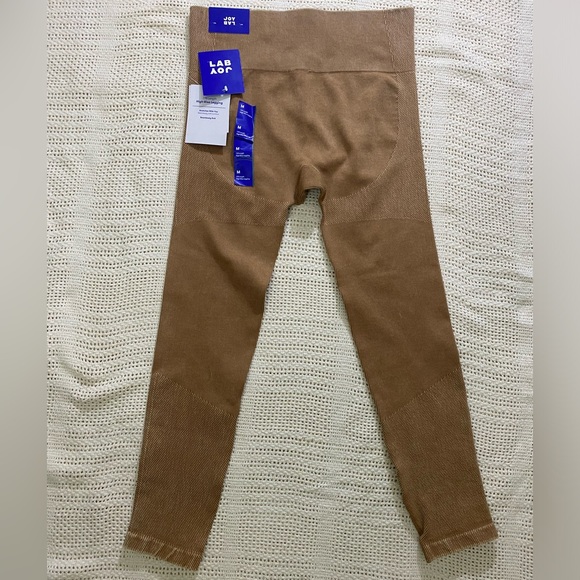 Women's High-Rise Ribbed Seamless
7/8 Leggings - JoyLab Tan Size M - Picture 2 of 6
